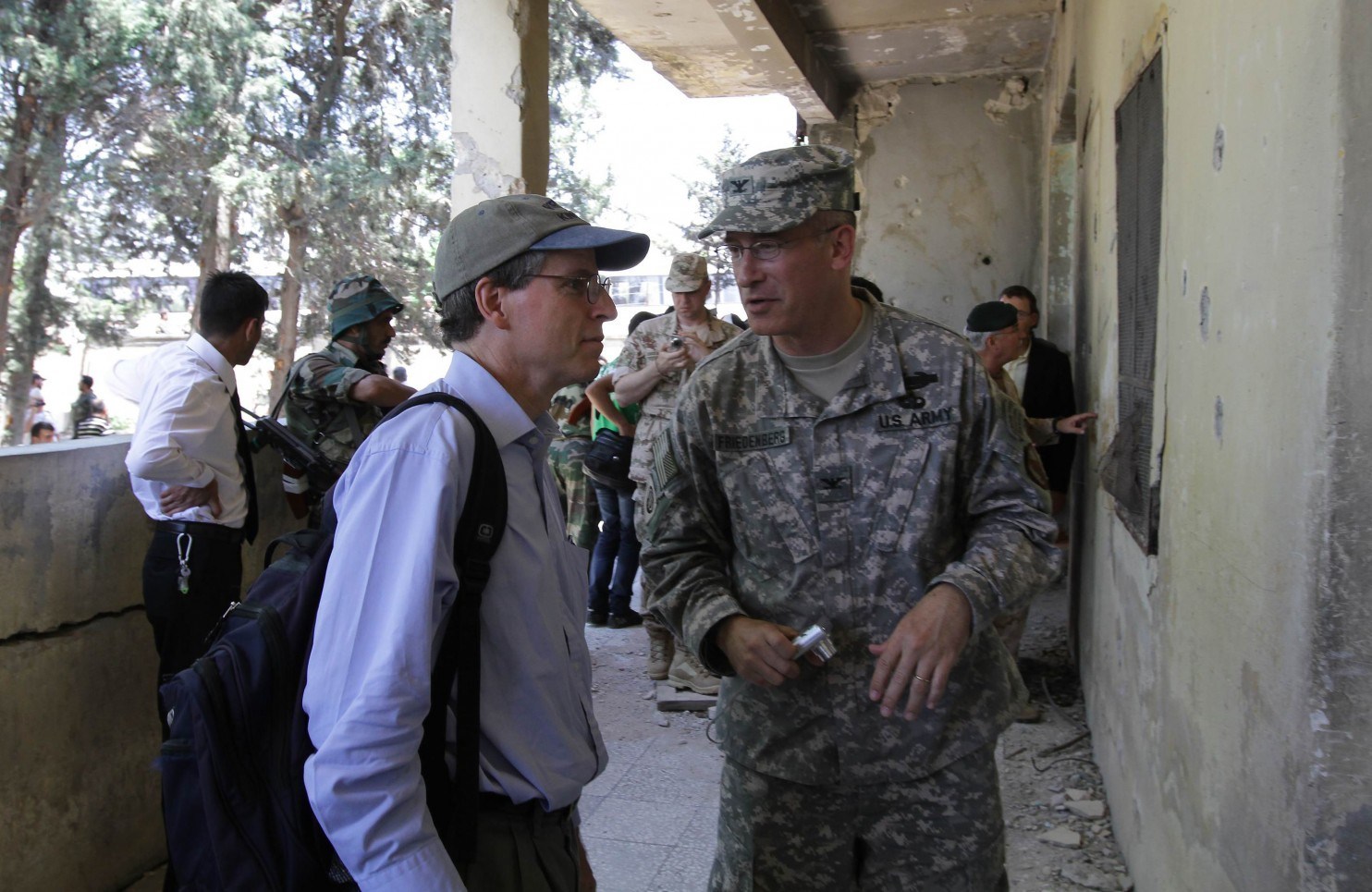 Robert Ford and a military attache in Syria.