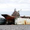 Russia may scrap its only aircraft carrier to avoid the embarrassment of towing it around the globe