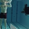 Watch: Physicist fires submerged SIG SG 550 rifle at himself to show how water stops bullets
