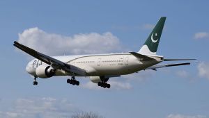Woman mistakes aircraft's emergency exit for lavatory -- plane evacuated as a result